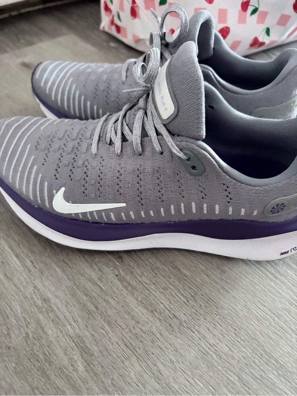 Nike Women’s Gray and Purple Knit Running Sneakers